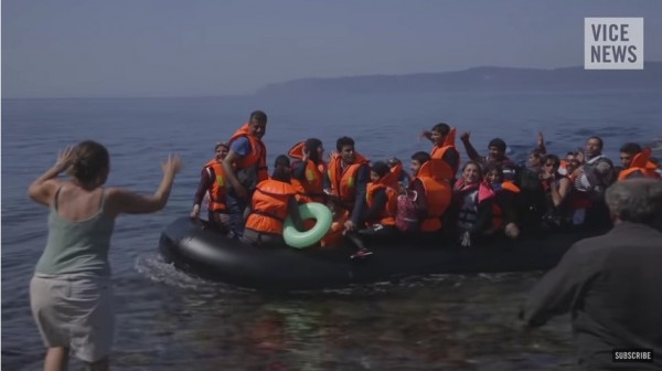 The Middle East refugees are looking happy to cross the sea from Turkey to Greece on Sep. 10.