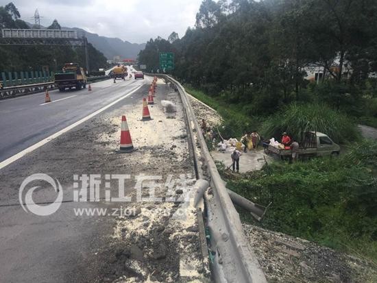 Crashed truck spilled rice onto ground. 