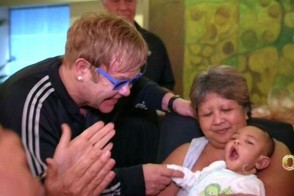 Elton John and Husband David Furnish Join Starkey Hearing Foundation to Help Deaf Children in the Philippines