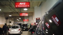 Cars sit in a lot at an Avis rental car branch in Manhattan on January 2, 2013 in New York City.