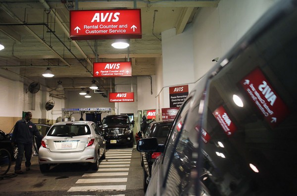 Cars sit in a lot at an Avis rental car branch in Manhattan on January 2, 2013 in New York City.