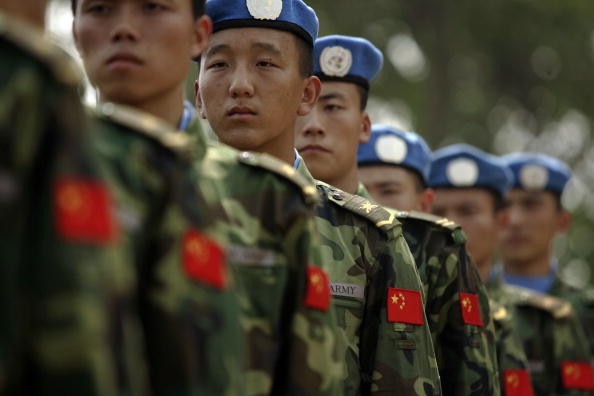 China's Defense Ministry has put its army on high alert following the ethic violence in the border towns of China and Myanmar.    