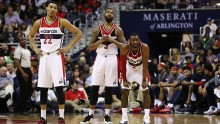 Washington Wizards players (from L to R) Otto Porter Jr, Markieff Morris, and John Wall