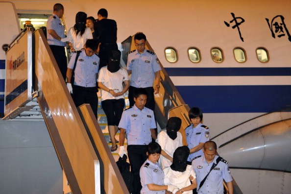 Malaysia Deports Taiwanese suspects to China.