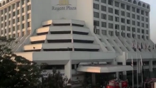 Regent Plaza Hotel following a pre-dawn fire in Pakistan's port city of Karachi on Monday