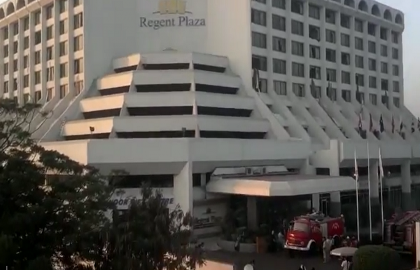 Regent Plaza Hotel following a pre-dawn fire in Pakistan's port city of Karachi on Monday