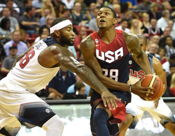 DeMarcus Cousins (L) and Bradley Beal compete against each other during a Team USA scrimmage
