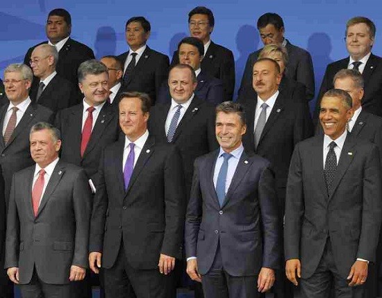 U.S. President Barack Obama poses with other world leaders for a group picture at the NATO Summit held in Newport, Wales from September 4-5.