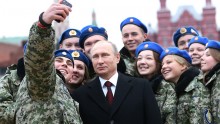 Vladimir Putin takes a selfie with army cadets
