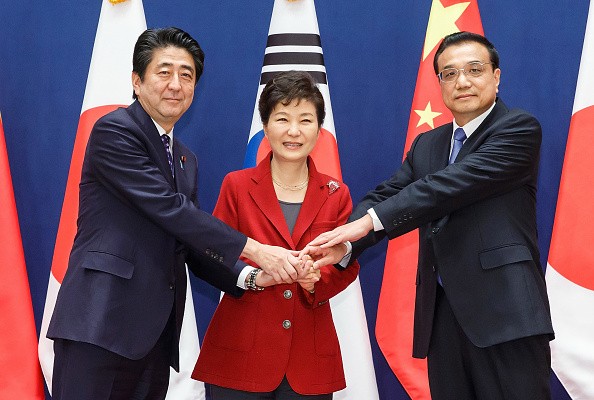 Japan Prime Minister Shinzo Abe and leaders from South Korea and China