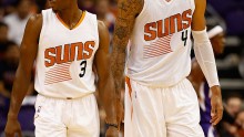 Phoenix Suns players Brandon Knight (L) and Tyson Chandler