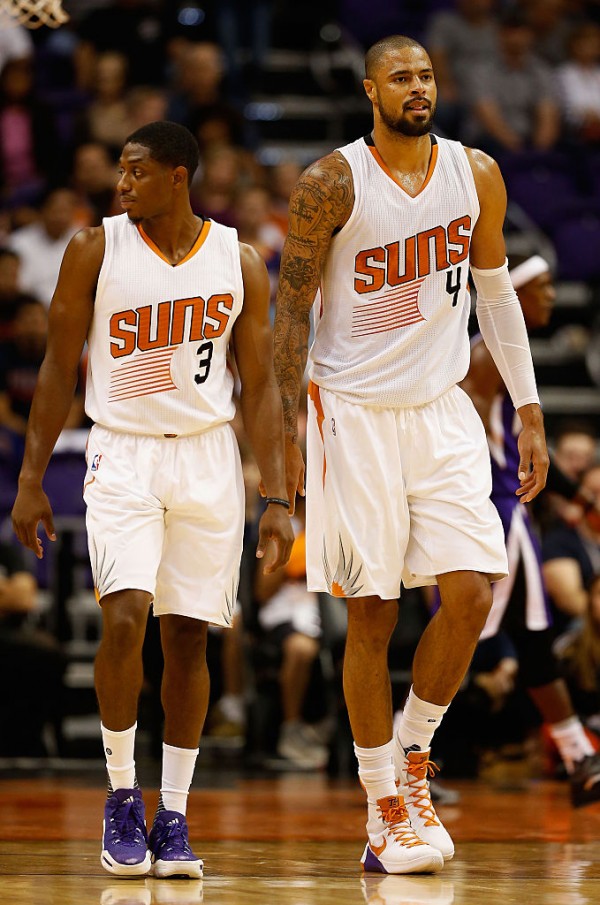 Phoenix Suns players Brandon Knight (L) and Tyson Chandler