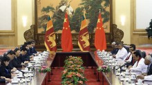 Sri Lanka's President Rajapaksa attends a meeting with China's President Xi at the Great Hall of the People in Beijing
