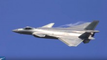 China's J-20 stealth fighter jet has been photographed sporting massive four extra fuel tanks.