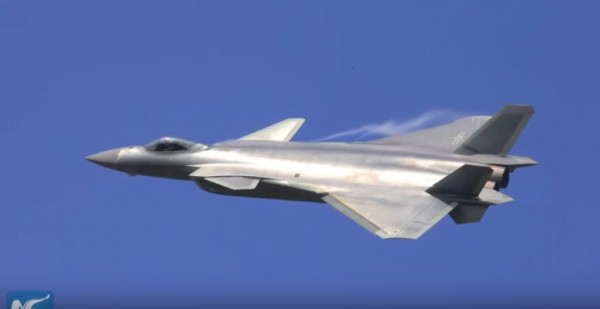 China's J-20 stealth fighter jet has been photographed sporting massive four extra fuel tanks.