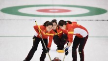 China curlers (from L to R) Wang Rui, Wang Bingyu, and Liu Jinli