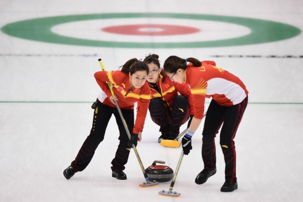 China curlers (from L to R) Wang Rui, Wang Bingyu, and Liu Jinli