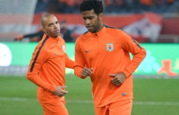 Shandong Luneng imports Diego Tardelli (L) and Gil