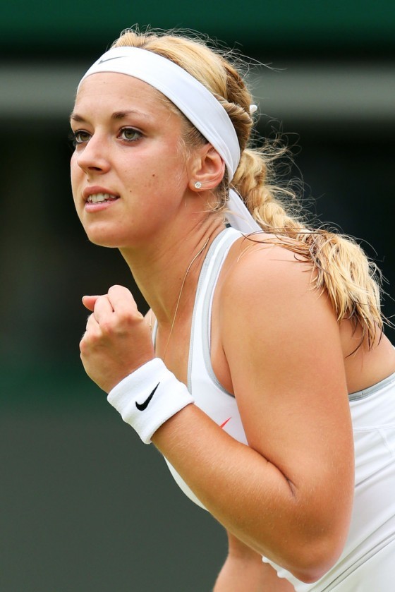 Top seed Sabine Lisicki crushed Grace Min of the United States and advanced to the quarter-finals of the Prudential Hong Kong Tennis Open