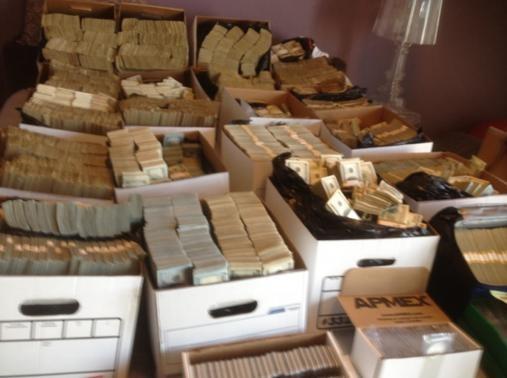 Boxes of cash seixed during FBI raid on Los Angeles fashion district