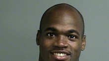 This photo provided by the Montgomery County sheriff’s office shows the booking photo of Adrian Peterson