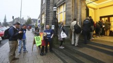 Voters wait for the polling station to open to cast their vote in Portobello near Edinburgh, Scotland, on Thursday.