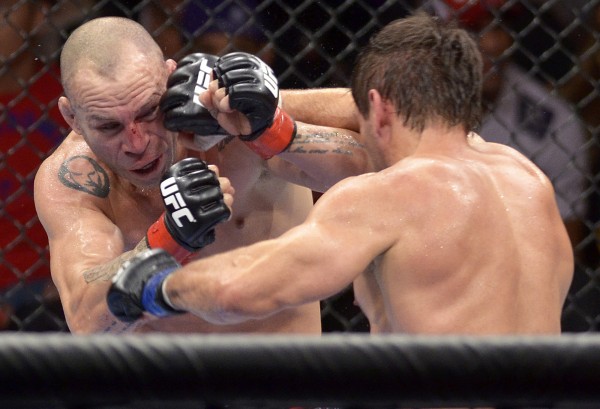 Wanderlei Silva (L) takes on Rich Franklin (R) in the UFC