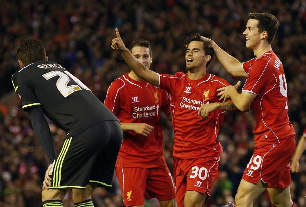 Liverpool's Suso (2nd R) celebrates after scoring during their League Cup soccer match against Middlesbrough at Anfield in Liverpool, northern England September 23, 2014.