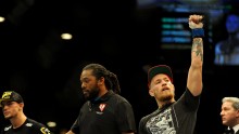 Sep 27, 2014; Las Vegas, NV, USA; Conor McGregor (blue gloves) is victorious over Dustin Poirier during a featherweight fight during UFC 178 at MGM Grand Garden Arena. 