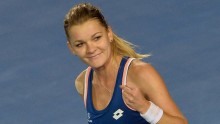 Rogers Cup champion Agnieszka Radwanska ousted by Italian Roberta Vinci in the second round of the China Open in Beijing