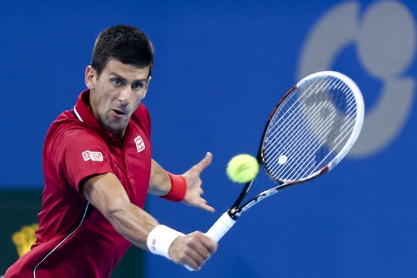 Defending Champion Djokovic marked his 21st straight victory at the China Open after beating Vasek Pospisil in Beijing