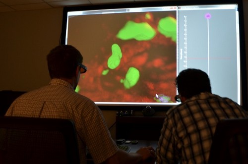 Andrew Cohen, PhD (right) and Eric Wait (left), are giving microbiologists an interactive look at the cells they're studying.