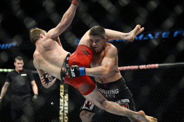 Rick Story (R) of the U.S. fights Iceland's Gunnar Nelson in a welterweight MMA bout at the Ultimate Fighting Championship (UFC) gala, at the Globe Arena in Stockholm, October 4, 2014.