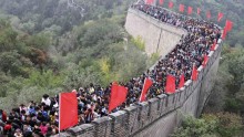 Tourists visit the Great Wall on the third day of the seven-day national day holiday, on the outskirts of Beijing, October 3, 2014.