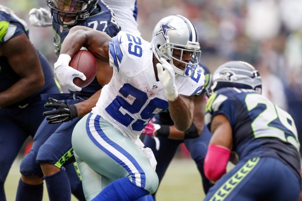Oct 12, 2014; Seattle, WA, USA; Dallas Cowboys running back DeMarco Murray (29) rushes for a touchdown against the Seattle Seahawks during the fourth quarter of a 26-20 Dallas victory at CenturyLink Field. 
