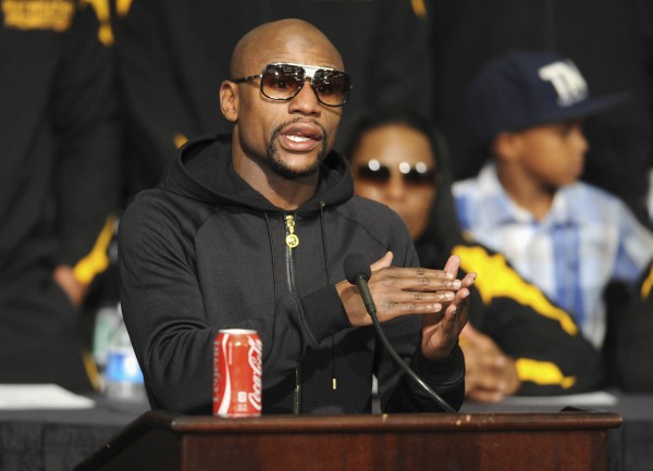 WBC/WBA welterweight champion Floyd Mayweather Jr. of the U.S. talks about his hand during a post fight news conference after beating Marcos Maidana of Argentina 