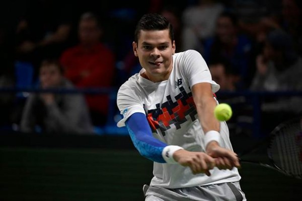 Lithuanian qualifier Ricardas Berankis ousted top seeded Milos Raonic in three sets 6-3 4-6 6-3 to reach the quarterfinals of the Kremlin Cup in Moscow