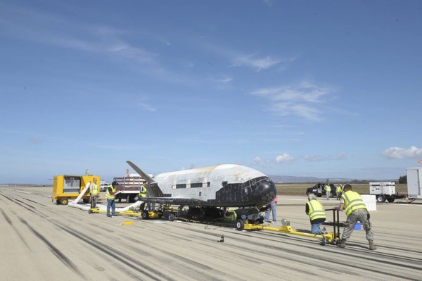 Vandenberg Air Force Base, UNITED STATESThe X-37B Orbital Test Vehicle mission 3 space plane is shown after landing at Vandenberg Air Force Base, California October 17, 2014 in this handout photograph provided by Vandenberg Air Force Base. The United Stat