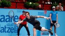 Top seeded Andy Murray rallied back from a set down against David Ferrer to win the Erste Bank Open in Vienna, Austria 