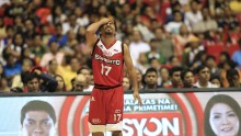 Manny Pacquiao, the playing coach of KIA-Sorento, reacts as he calls for a foul during the first quarter of a basketball match against the Blackwater-Elite during the 40th Season of the Philippine Basketball Association (PBA) games in Bocaue town, Bulacan