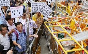 Pro-Democracy Protesters and Taxi Drivers Clash In Mong Kok
