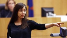 Jodi Arias points to her family as a reason for the jury to give her a life in prison sentence instead of the death penalty during the penalty phase of her murder trial at Maricopa County Superior Court in Phoenix, Arizona May 21, 2013.