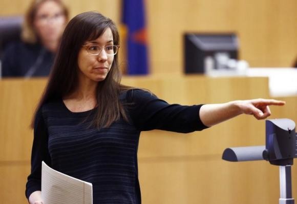 Jodi Arias points to her family as a reason for the jury to give her a life in prison sentence instead of the death penalty during the penalty phase of her murder trial at Maricopa County Superior Court in Phoenix, Arizona May 21, 2013.
