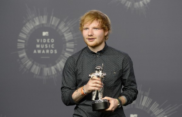 Singer Ed Sheeran poses backstage after winning the award for best male video for "Sing" during the 2014 MTV Video Music Awards in Inglewood, California August 24, 2014.
