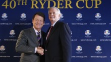 Golfer Tom Watson (L) and PGA of America president Ted Bishop (R) pose for photographers following a press conference to introduce the Ryder Cup captain in New York, December 13, 2012. Watson was named captain of the 2014 United States Ryder Cup team on T