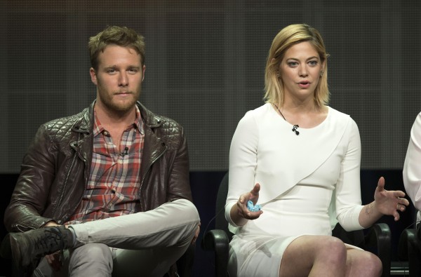 Cast member Analeigh Tipton speaks next to co-star Jake McDorman at a panel for the ABC television series "Manhattan Love Story" during the Television Critics Association Cable Summer Press Tour in Beverly Hills, California July 15, 2014. 