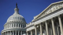 The U.S. Capitol and U.S. Senate (R) in Washington, August 2, 2011.
