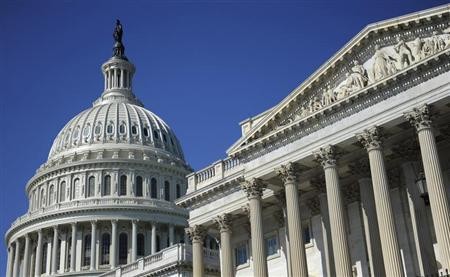 The U.S. Capitol and U.S. Senate (R) in Washington, August 2, 2011.