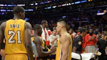 Oct 28, 2014; Los Angeles, CA, USA; Los Angeles Lakers forward Julius Randle (30) shakes hands with guard Jeremy Lin (17) after an injury during the second half against the Houston Rockets at Staples Center. 