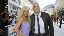 Actress Jenna Jameson and boyfriend, Ultimate Fighting Championship star Tito Ortiz, pose at the 2010 MTV Video Music Awards in Los Angeles, California.
